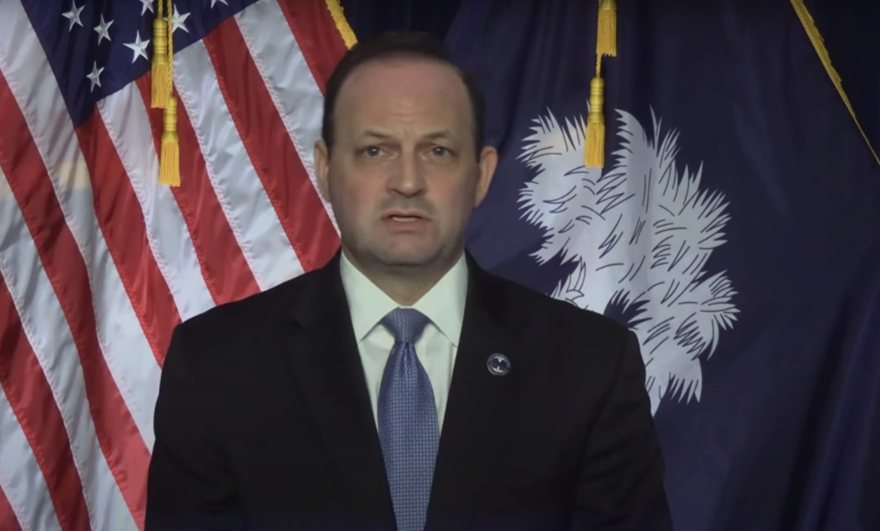 Alan Wilson speaking at a podium